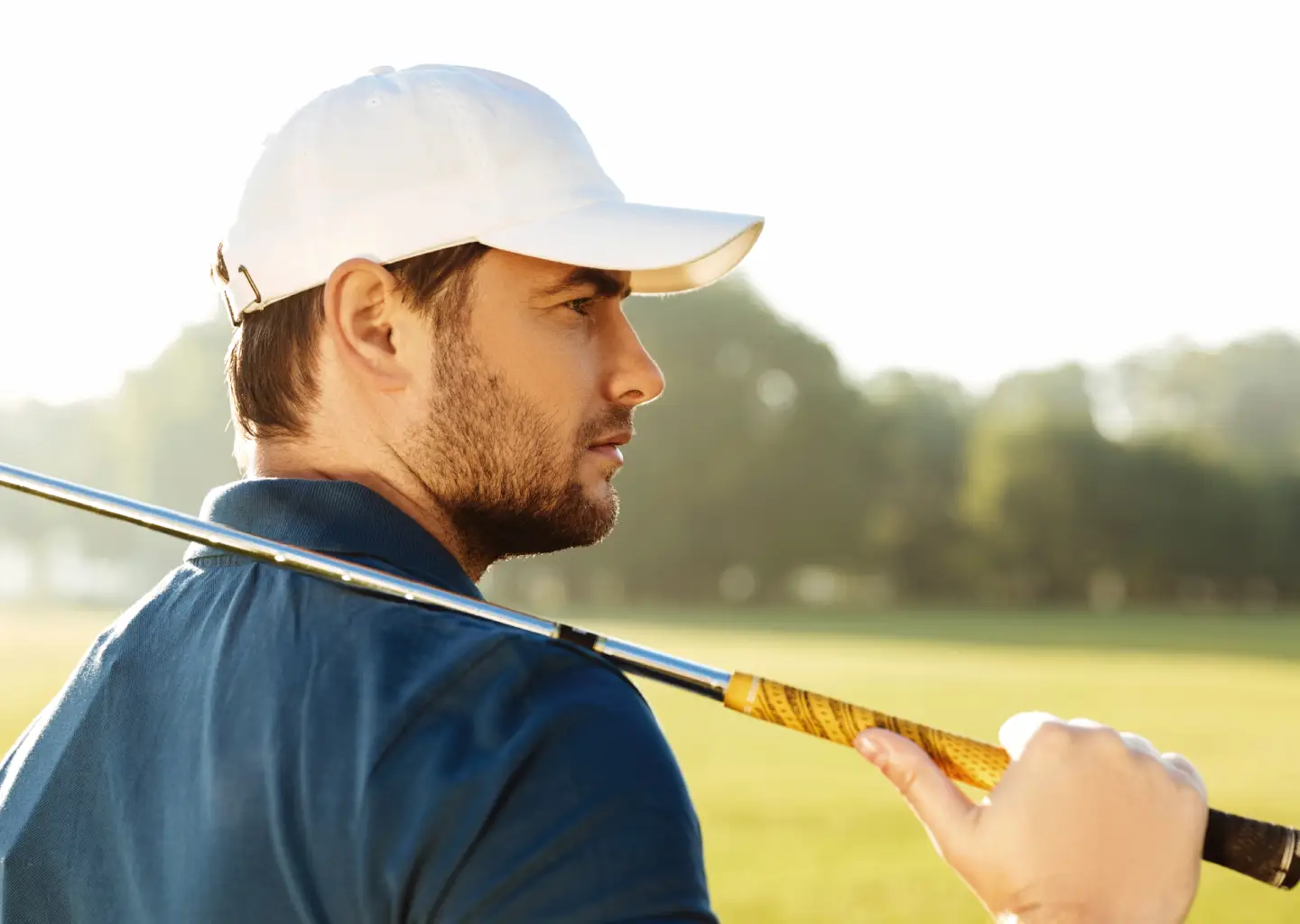 young-handsome-male-golfer-hat